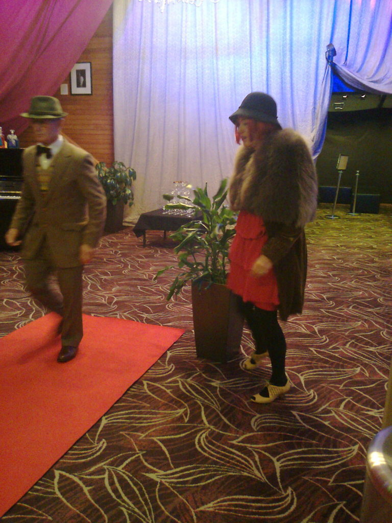 Kimberly Cleland and Frank Parnwall setting up the red carpet