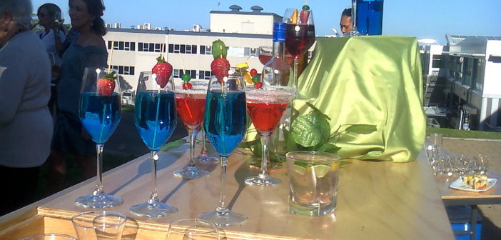 Vibrant coloured cocktails complete the summer evening